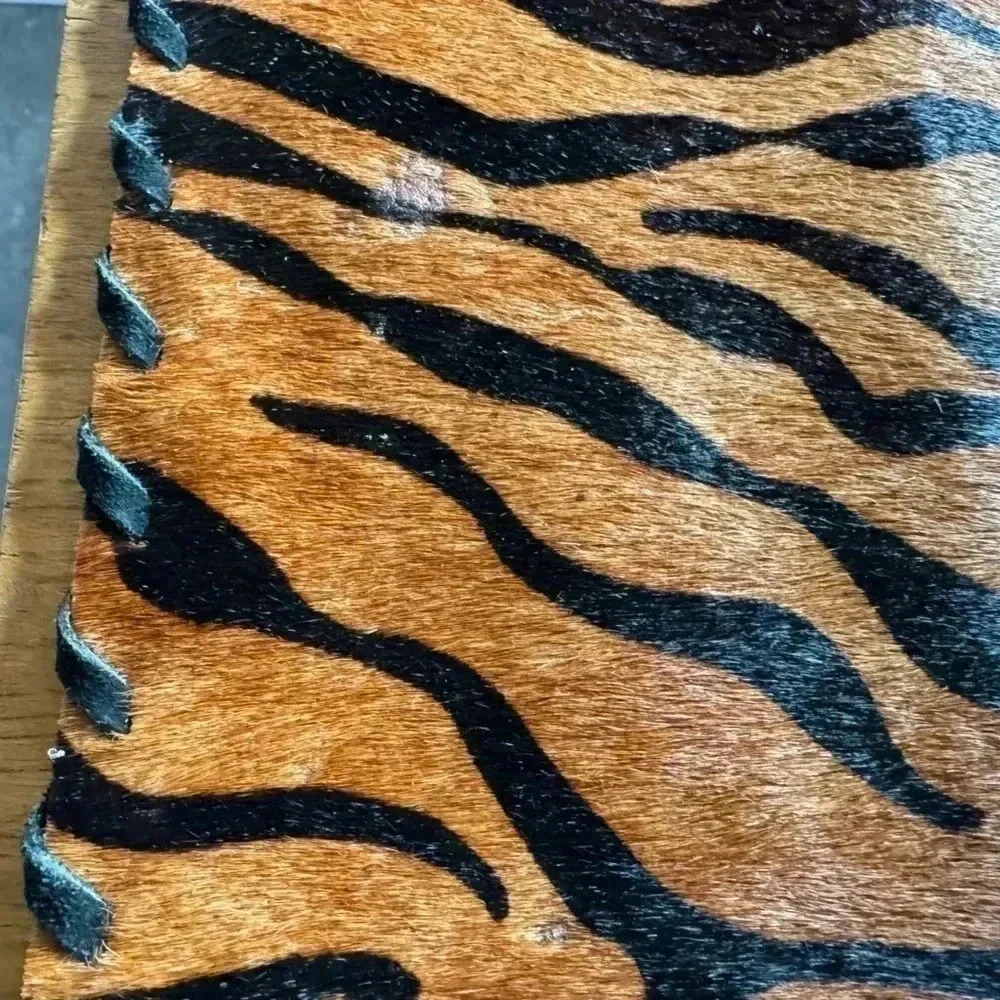Cow hide tiger strip placemat.  A few areas where hair is gone. See photos. - Picture 6 of 7